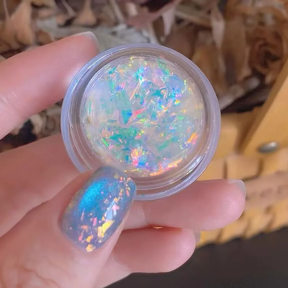 1 pudełko Aurora proszek do topienia śniegu ultra-cienki 0.5g opalowe proszki do paznokci holograficzny chrom syrenka kameleon DIY Pigment do Manicure