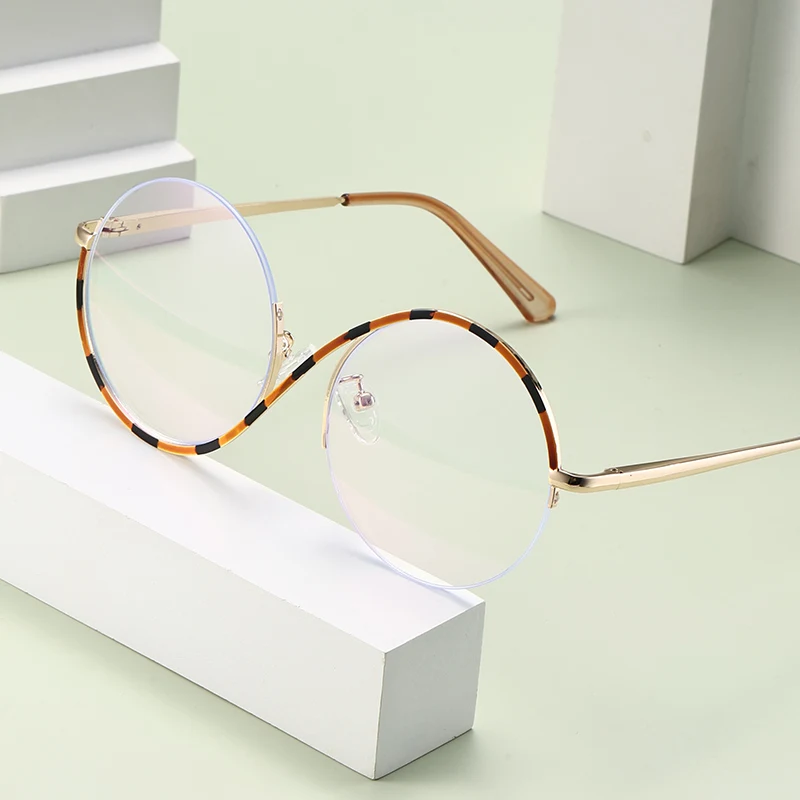 ラウンドパーソナリティフレーム抗青色光メガネモダンな金属スプリングヒンジ付きメガネ
