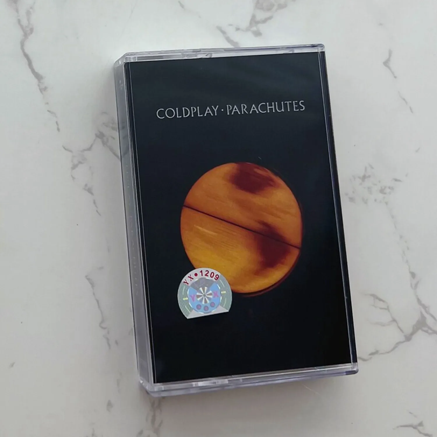

Sealed Coldplay Parachutes Alternative Rock Indie Pop Audio Cassette Tape Retro Analog Sound Collectible for Fans Home Art Decor