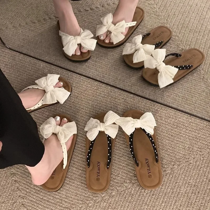 

Женские тапочки, модные нескользящие сандалии с милым бантом, износостойкие удобные пляжные уличные тапочки на мягкой подошве на плоском каблуке
