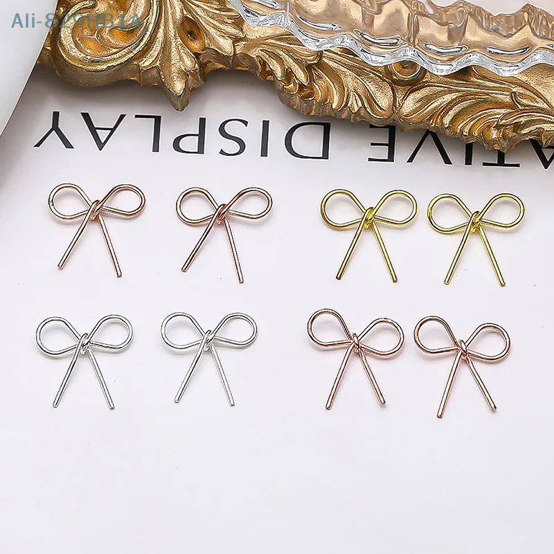 10 stücke 3d Legierung Bowknot Nail Art Charms heiliges Band Bogen Nagel Dekorationen Silber goldenen Nagel Strass DIY Salon Luxus schmuck