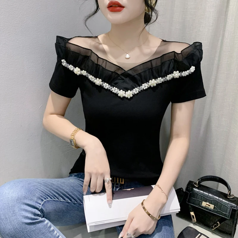 Camiseta de hombros descubiertos para mujer, manga corta, ajuste ceñido, moda de verano, diseño europeo, con encaje de red y ...
