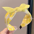 2  yellow bow flower