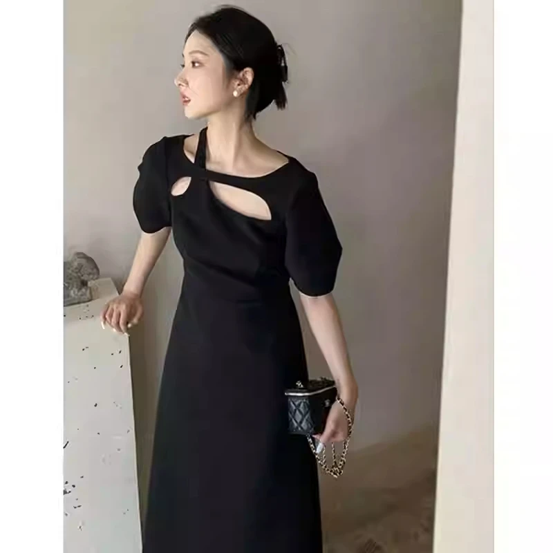 Abiti a trapezio dal design scavato estivo da donna Abito francese a maniche corte di grandi dimensioni Moda dimagrante Vestibilità nuovo stile Tinta unita