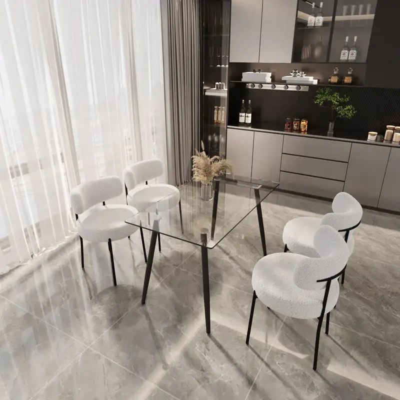 ชุดโต๊ะอาหารกระจกโมเดิร์นขนาด 51.2 นิ้ว x 27.5 นิ้ว พร้อมขาโลหะสีดำและเก้าอี้กำมะหยี่สีขาว 4 ตัว สำหรับพื้นที่รับประทานอาหารที่มีสไตล์