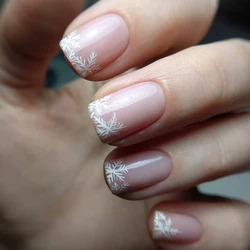 A full set of 24 short square fake nails designed with a light pink snowflake French pattern, including 1 jelly glue and 1 nail