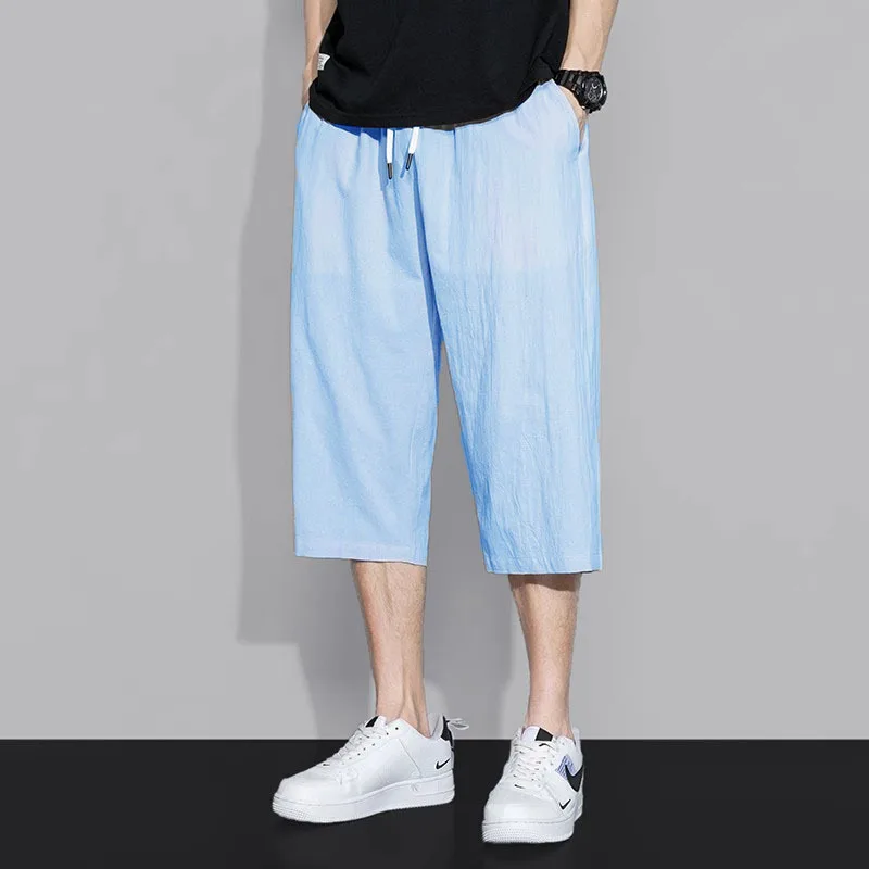 กางเกงขาสั้นผู้ชายทรงตรงแบบสบายๆ น้ำหนักเบา ผ้าบางเบา มีเชือกผูกเอว เหมาะสำหรับใส่ลำลอง ออกกำลังกาย หรือไปเที่ยวชายหาด