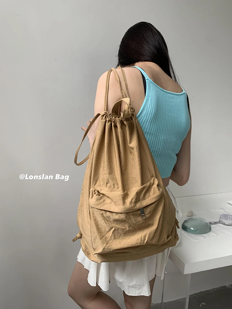 Mochila de viagem para mulheres, estilo cool meninas, cor sólida, cordão, nylon, bolsa de ombro, design de nicho, Y2k, fêmea