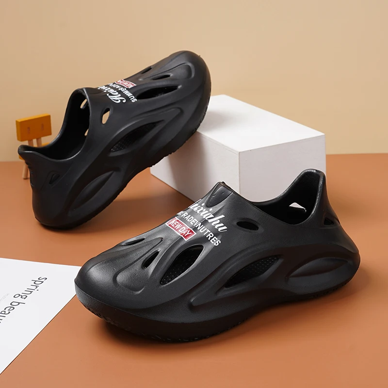 A pair of children's hollow platform clogs lightweight EVA anti-slip breathable daily water outdoor sandals QT-24A099