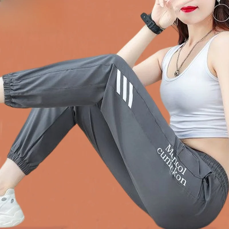 

Ледяной шелк Qui Dry Спортивные брюки Женские летние тонкие повседневные брюки Harlan с девятью очками Длинные брюки с высокой талией в Корейском стиле