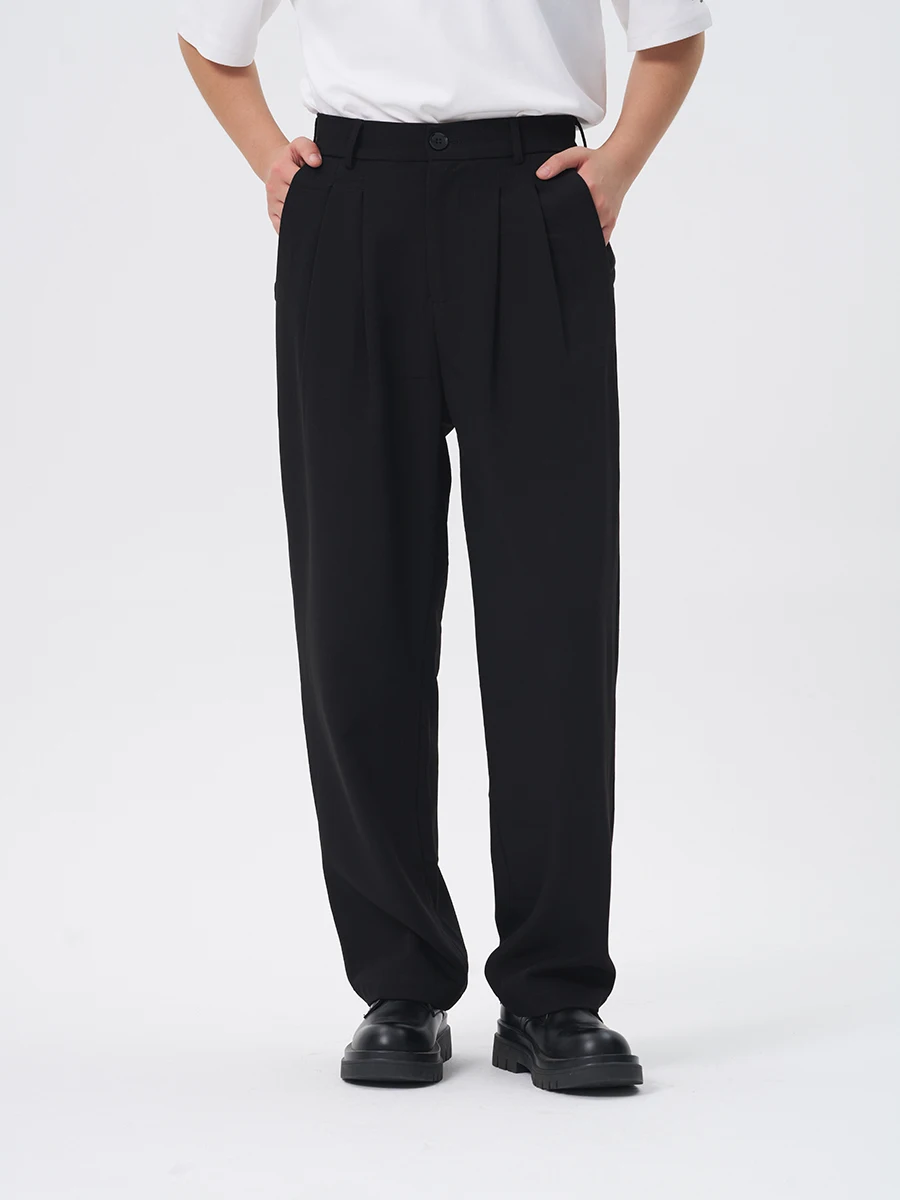 Spodnie do pracy Cookawu Commuter o prostych nogawkach, z półelastyczną talią, podstawowe, lejące się, wyszczuplające, uniwersalne, neutralne, w kolorze czarnym.