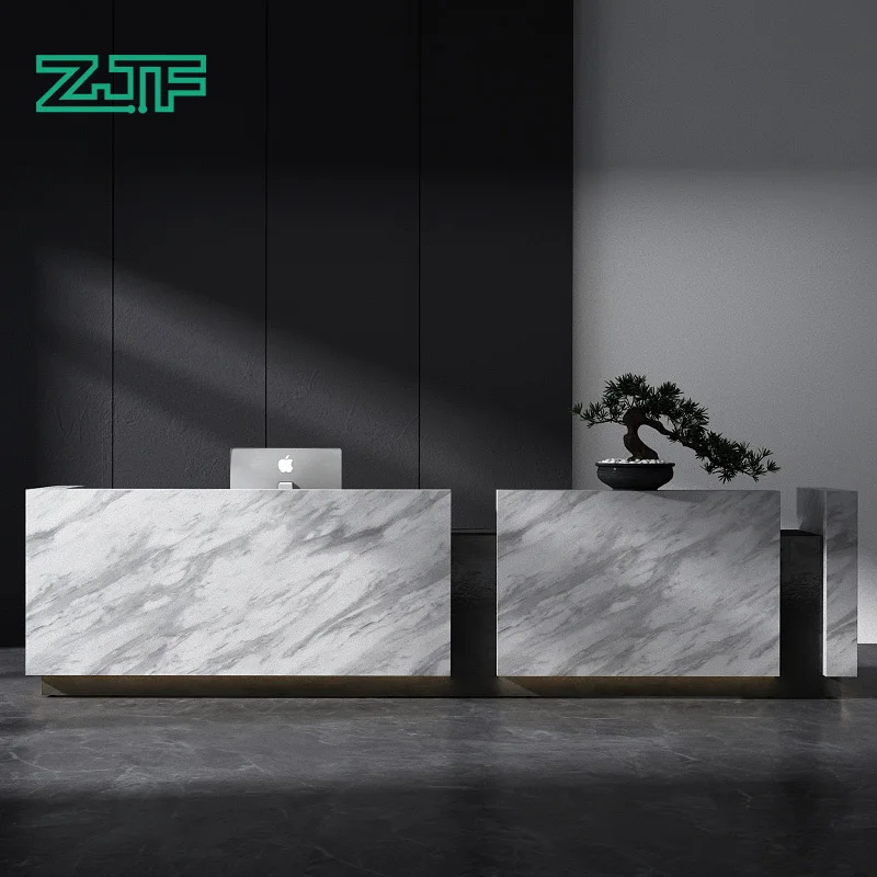 

The company's ultra long reception desk is modeled after a marble cash register, and the hotel lobby service desk