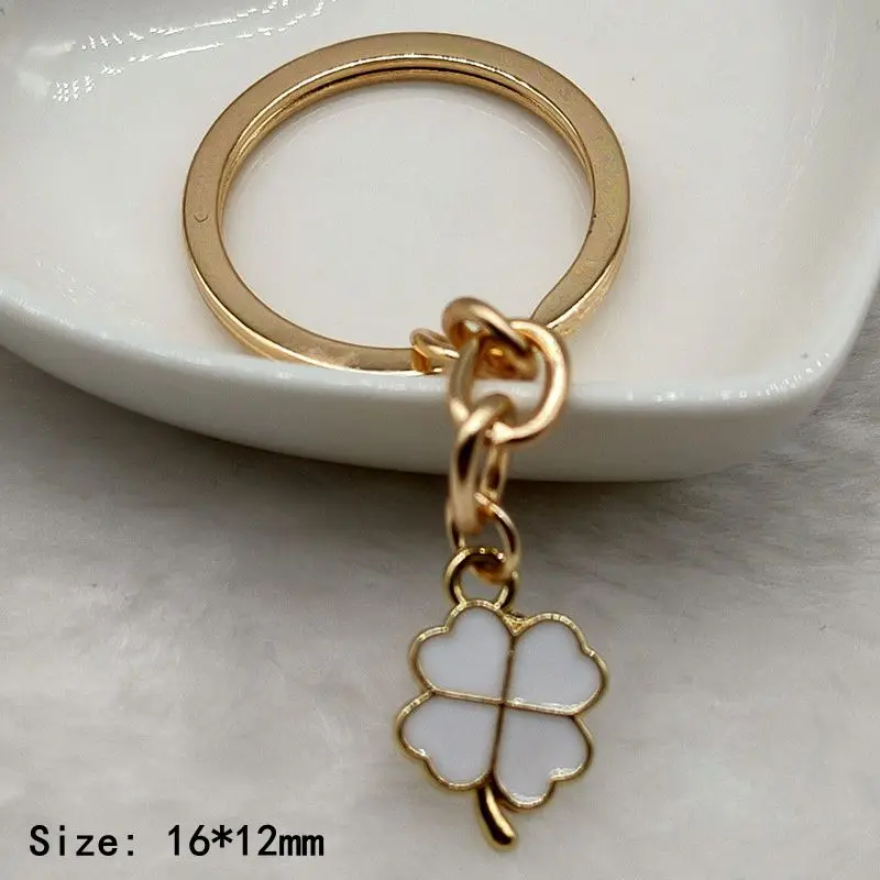 Creative multi-color enamel Four-leaf clover lucky key chain pendant bag accessories girl key chain Christmas gift sales