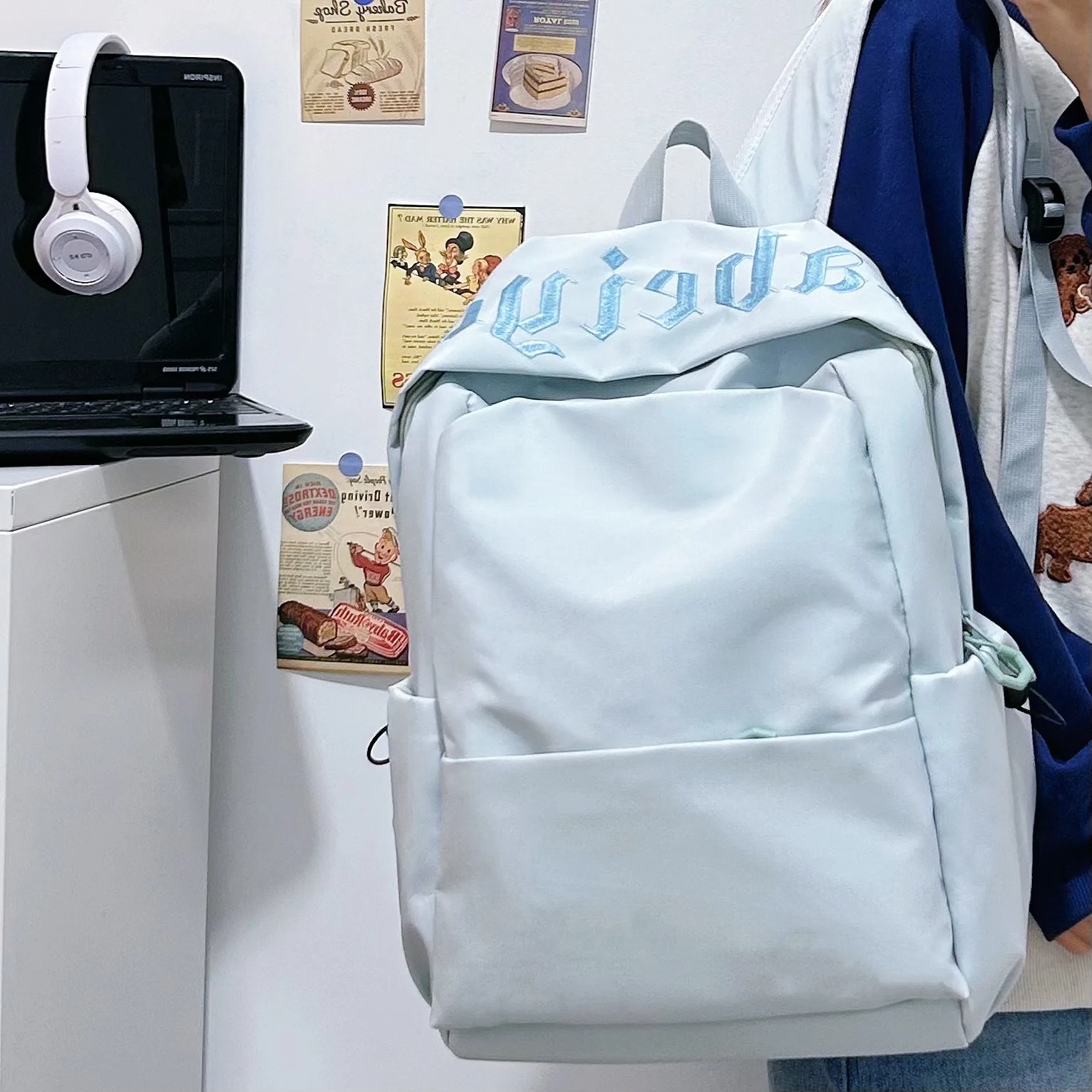 

Новый рюкзак 2025 года для мужчин и женщин, простой однотонный цвет, большая вместимость, многофункциональный рюкзак, средняя и старшая школа