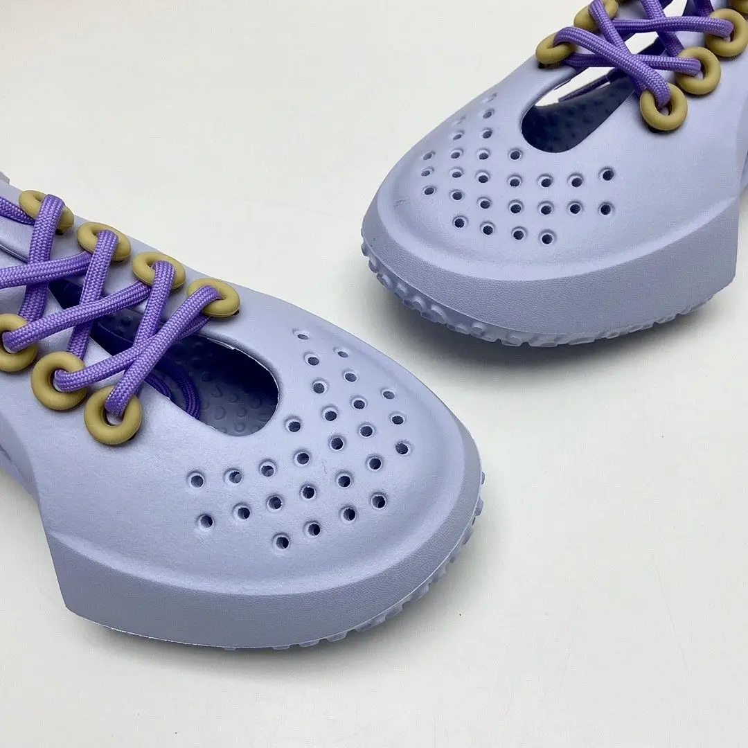 

New non-slip breathable perforated walking shoes comfortable ladies casual running shoes EVA surface men's casual sneakers
