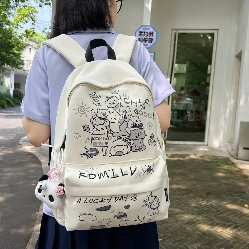 حقيبة ظهر نسائية جرافيتي لطيفة على الموضة كرتونية حقائب ظهر كاجوال من النايلون للطالبات كاواي خفيفة الوزن حقائب نسائية فاخرة