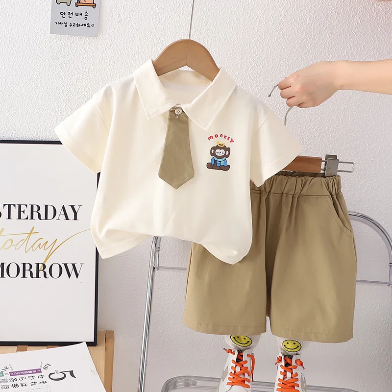 

2024 Baby Summer Clothes for Kids Boy and Girl Fashion Turn-down Collar Short Sleeve T-shirts + Shorts Boys Boutique Outfit Set