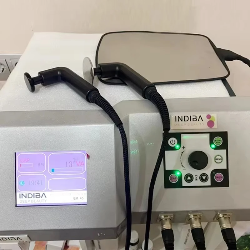 INDIBA آلة تخسيس الجسم للتجميل العميق أجهزة شد الوجه نظام R45 للبشرة RF عالي التردد 448 كيلو هرتز تكنولوجيا فقدان الوزن إسبانيا