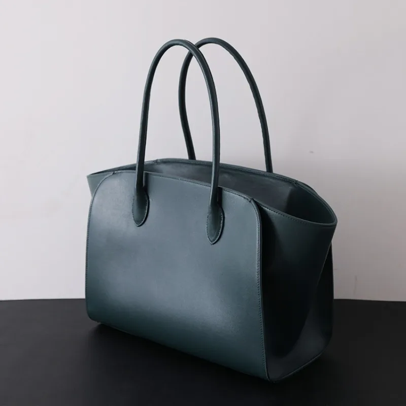

Niche Trend First Layer Cowhide Large Capacity Tote Bag Leather Wings Light Luxury High Texture Commuter Bag Casual Versatile