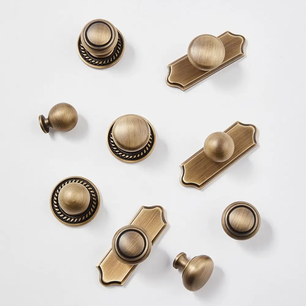 سهلة التركيب الشمال النحاس خزانة سحب الذهب جولة الصلبة النحاس مقبض درج ثقب واحد دائم مقبض باب الخزانة باب خزانة الملابس