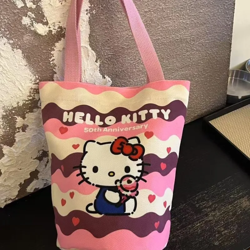 

Hello Kitty Kawaii Handbag Student Commuting Canvas Bag Cartoon Multi Functional Portable Handbag Wholesale of Women Accessories