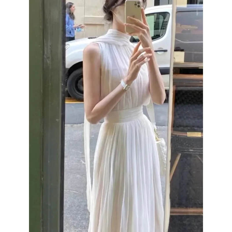 

Летний женский комплект из 2 предметов с юбкой в корейском стиле, модный тонкий белый костюм без рукавов с лямкой на шее, костюм феи, женская одежда, однотонная