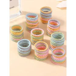 Banda de goma colorida para bebé, piezas de 2cm, no daña el cabello, anillo pequeño para el pulgar, hilo elástico alto, juego de Scrunchies para niños pequeños, 100