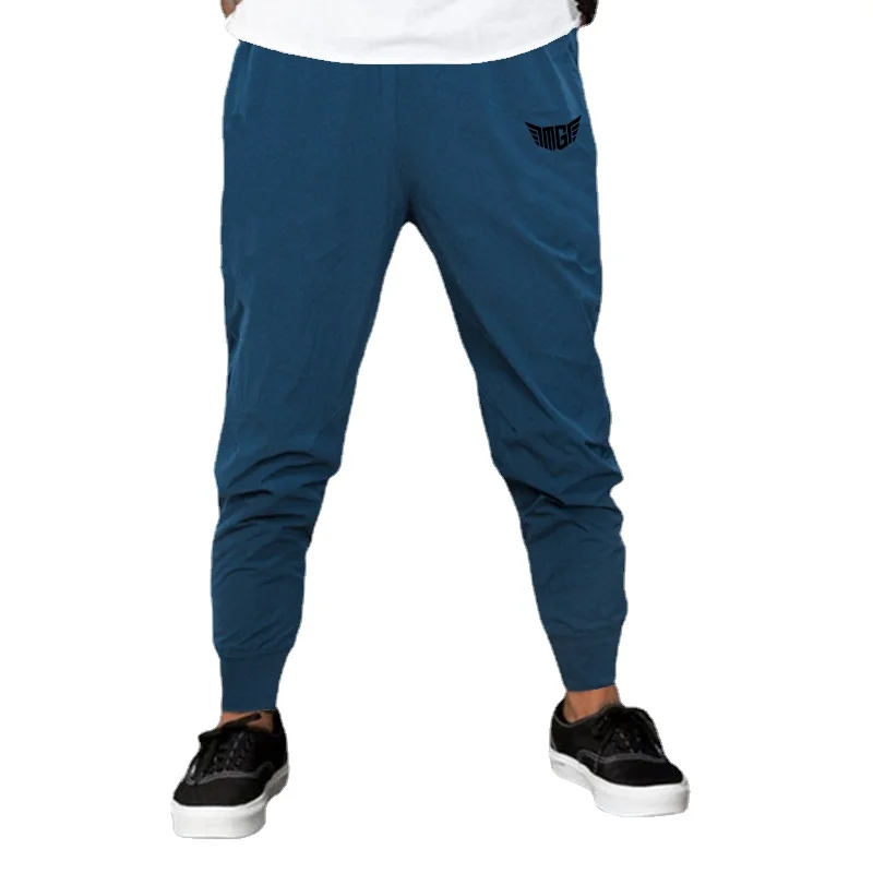 Pantalones transpirables con estampado de letras para hombre, ropa de calle de Fitness, cintura elástica, culturismo, moda de otoño, 4 colores