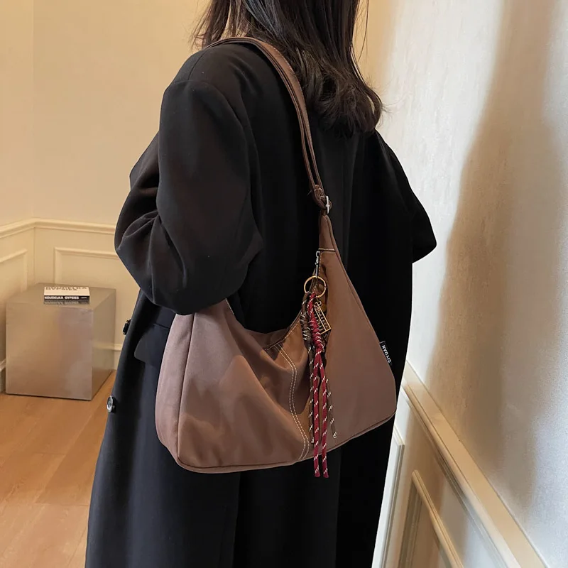 

Повседневная женская сумка через плечо на одно плечо, 2025 г., большая вместительная студенческая сумка, высококачественная сумка-мессенджер, однотонная сумка для книг