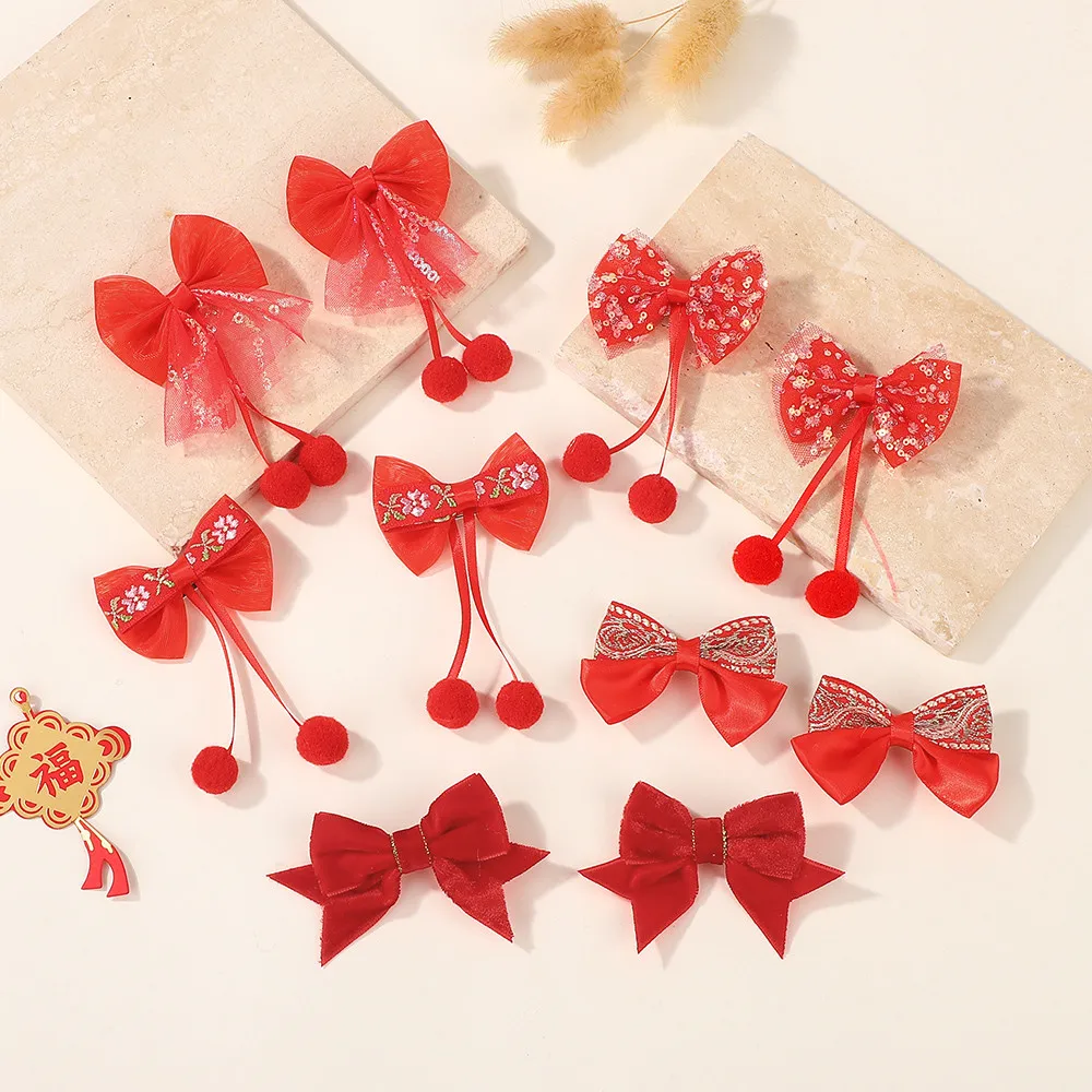 

2pcs/set New Year Red Bow Hair Clips with Plush Ball for Women Girls Cute Embroidery Bowbot Hairpins Festive Hair Accessories