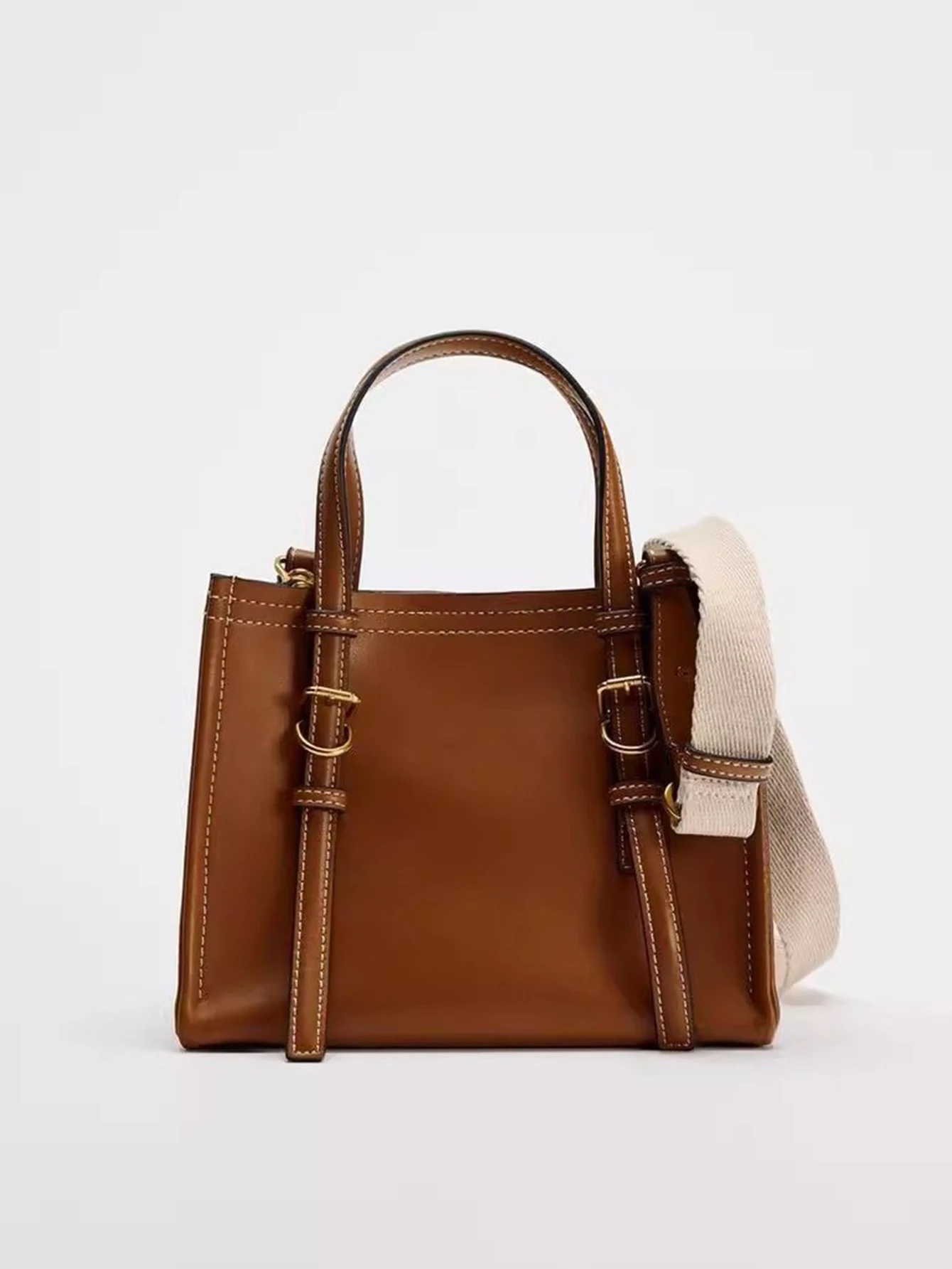 

Autumn and winter retro solid color simple hand-held shoulder crossbody bag, casual commuting, versatile daily, lazy style