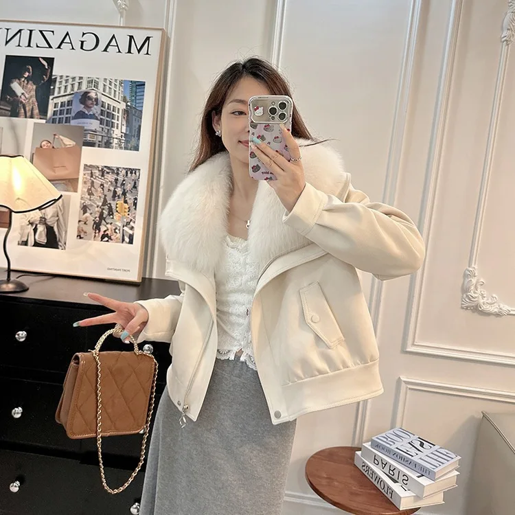 

2025 зимнее новое замшевое короткое пальто с темно-синим воротником из искусственного лисьего меха для женщин