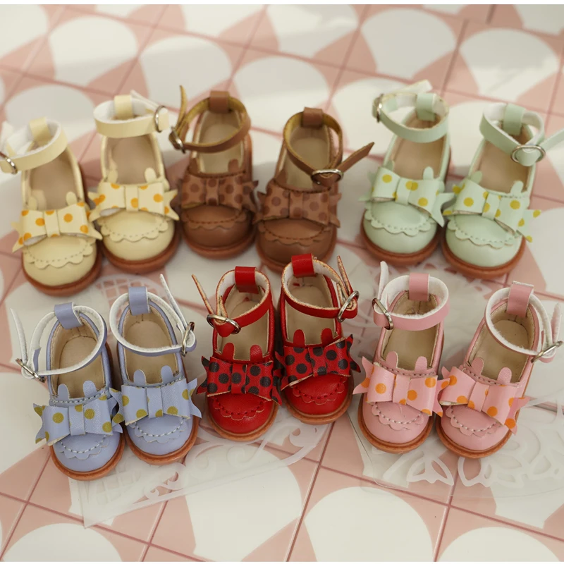 

1/6 Bjd Кукольная обувь ручной работы 4,5 см * 1,8 см Цветная блокировка Большой бант Металлическая пряжка Туфли принцессы для кукол Аксессуары Игрушечные туфли на плоской подошве