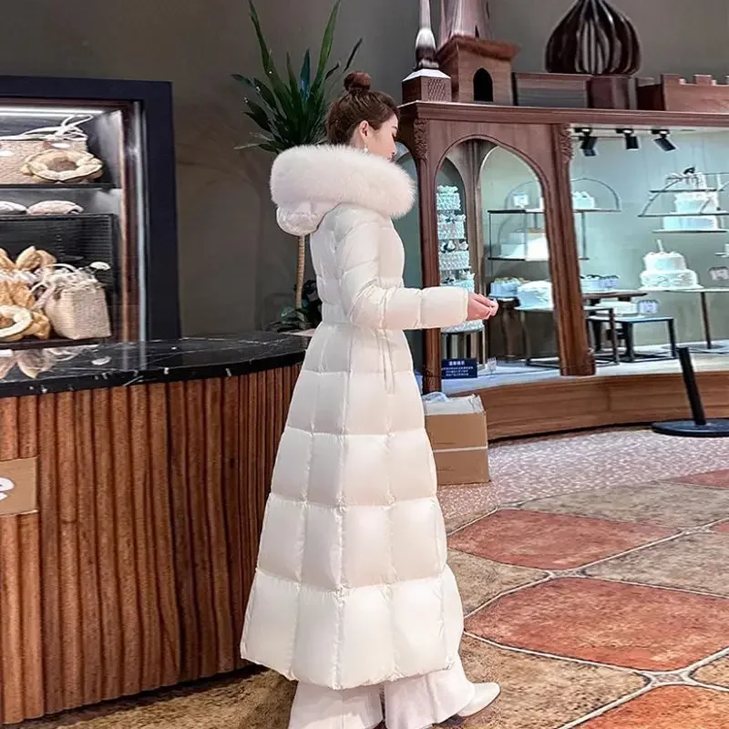 2025 Cappotto lungo da piumino in cotone da donna alla moda invernale nuova da pendolare a vita alta slim fit con cappuccio