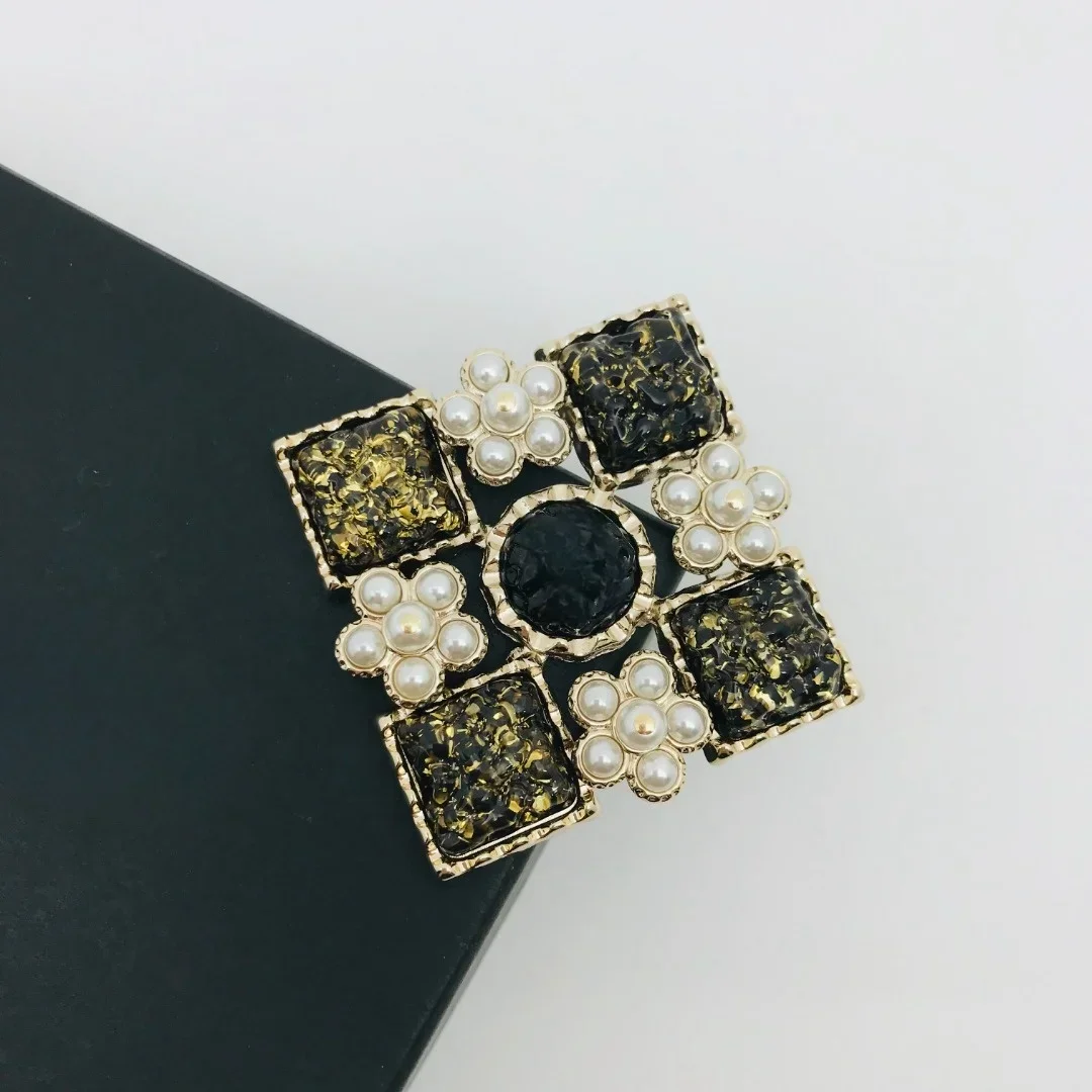 

Square petaled lava combination brooch