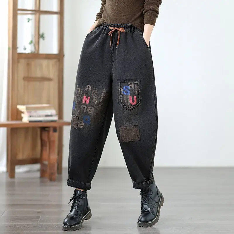 Retro velvet thick fashion street jeans women's winter new letter print loose casual fashion artistic harem pants