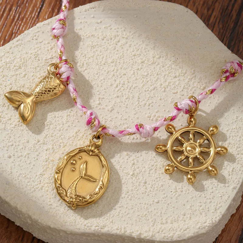 Golden Tone Braided Cord Ocean Charm Bracelet with Mermaid Tail and Ship Wheel Pendants for Women
