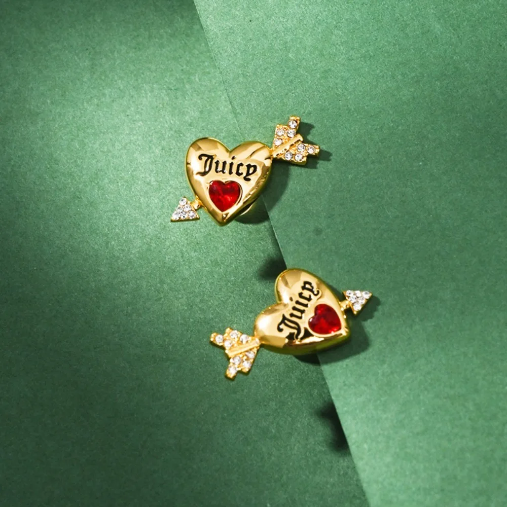 

New Women's Earrings With an Arrow Through a Heart Design and Inlaid With Zircon in 925 Sterling Silver.
