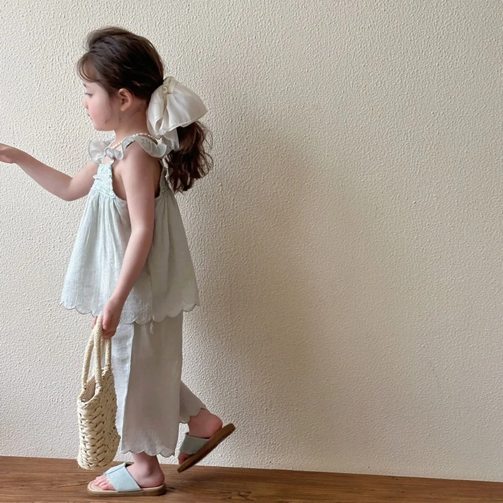 Bear Leader النسخة الكورية بلون الفتيات ملابس الصيف جديد أنيق الحلو حزام أعلى + بانت 2 قطعة مجموعة أزياء ملابس أطفال غير رسمية