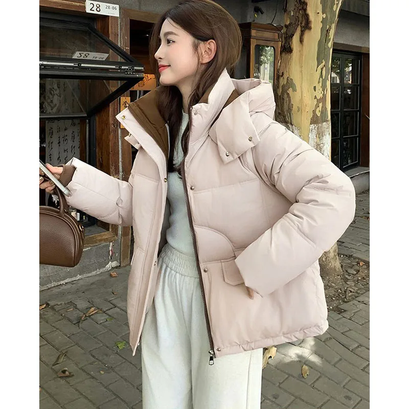 Neue weibliche kurze Baumwolle gefütterte Jacke, Winter dicker warmer Daunen-Baumwollmantel, koreanische lose Parker-Steppjacken mit Kapuze für Damen