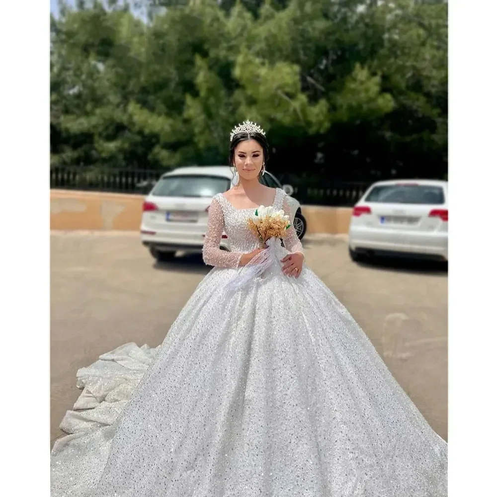 Luxurious Sparkling Lace Bead Princess Wedding Dress Sexy Square Neck Transparent Long Sleeve Auditorium Bridal Dress Customized