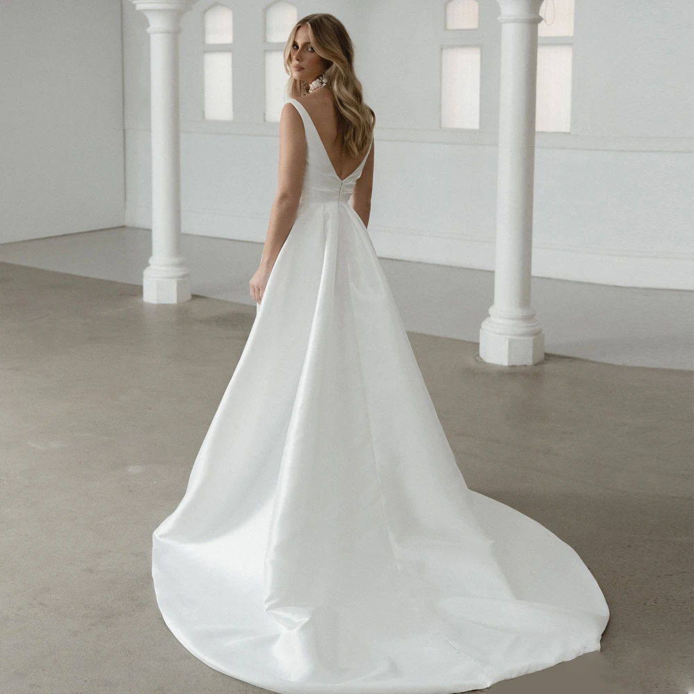 Semplici abiti da sposa senza maniche bianchi per le donne Growns da sposa con spalline sottili con scollo a v Vestidos De Novia Backless 2024