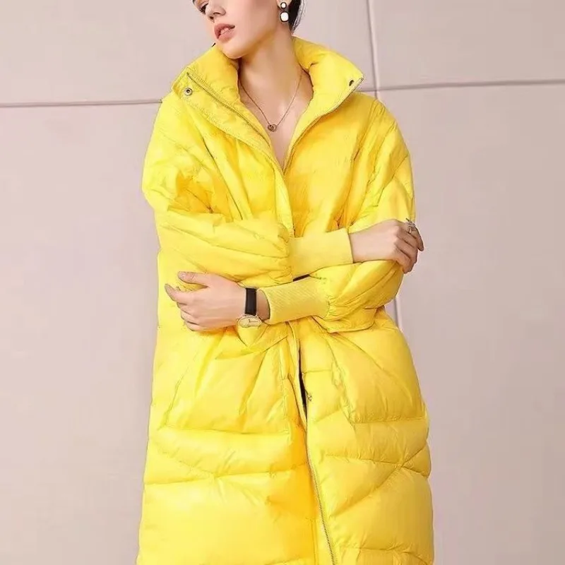 Piumino in piumino d'anatra bianco giallo lucido di fascia alta da donna medio e lungo invernale versione coreana ampia e sottile personalizzata da strada