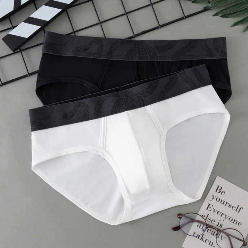 Solid color fashion sweat-absorbing men's modal underwear thin summer breathable briefs youth 233