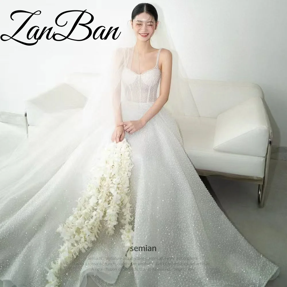 ZanBan  Customized White Luxury Bright face Wedding Dress Spaghetti Strap Sweetheart Collar Shiny Brush Tail Wedding Dress 2026