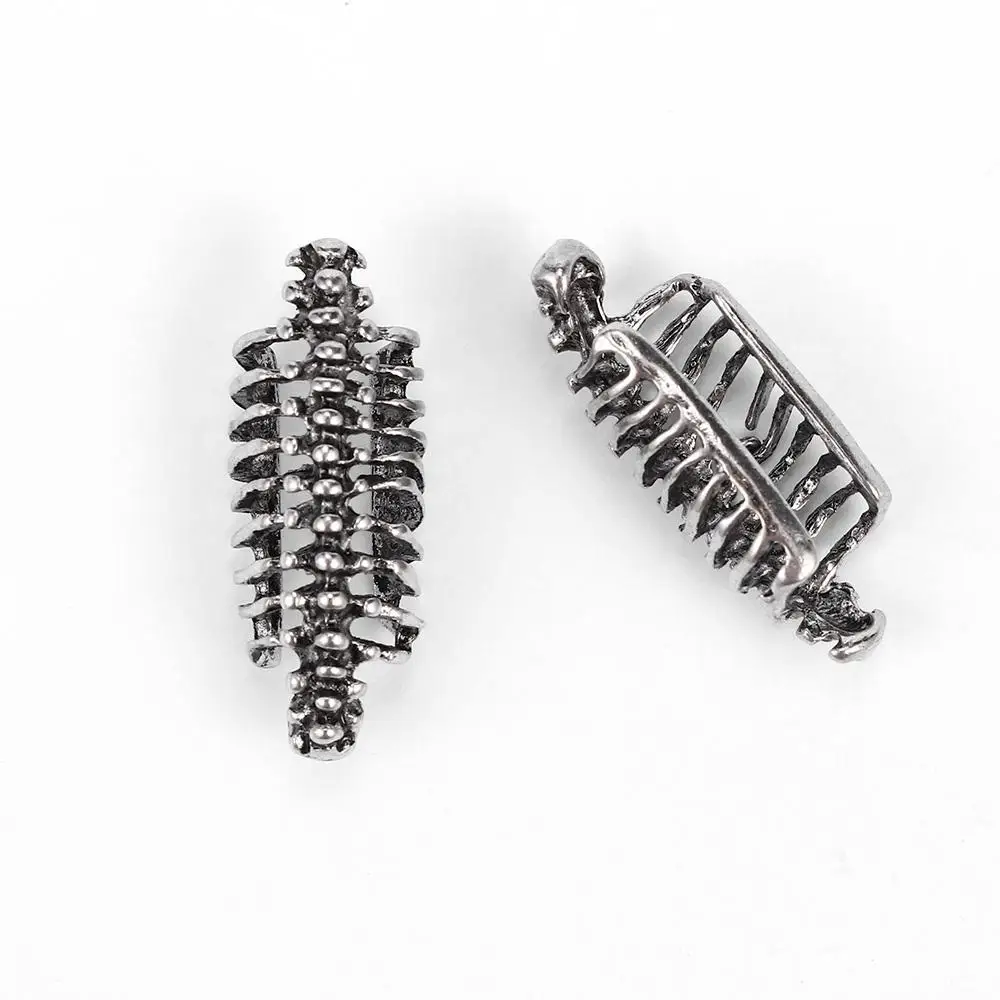 التفاف الرجعية العمود الفقري للجنسين الرجال كليب مسمار اليد مثقوب الأقراط الجمجمة الشرير القوطية