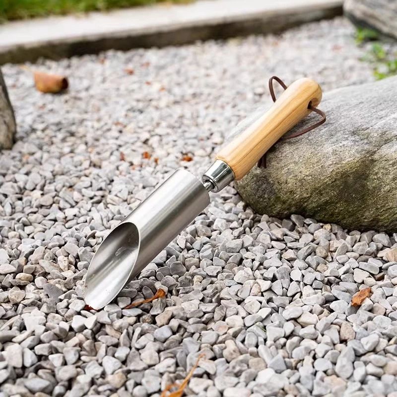 Outdoor stainless steel gardening tools, seedlings, potted plants, flowers, digging soil, seedlings