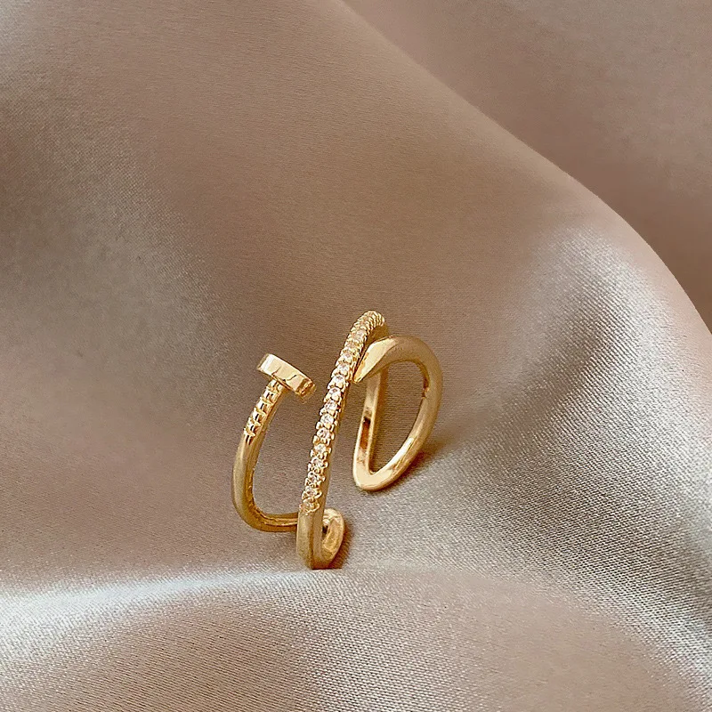 Anillo de pareja de moda clásica, anillo ajustable de circonita de cobre para mujer, anillo de aguja de cristal de Metal dorado de moda