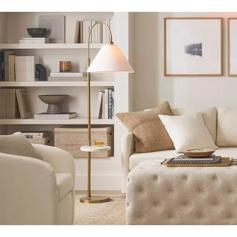 

The interior living room and bedroom are made of brass, hand-finished bronze, and tumble brass floor lamps