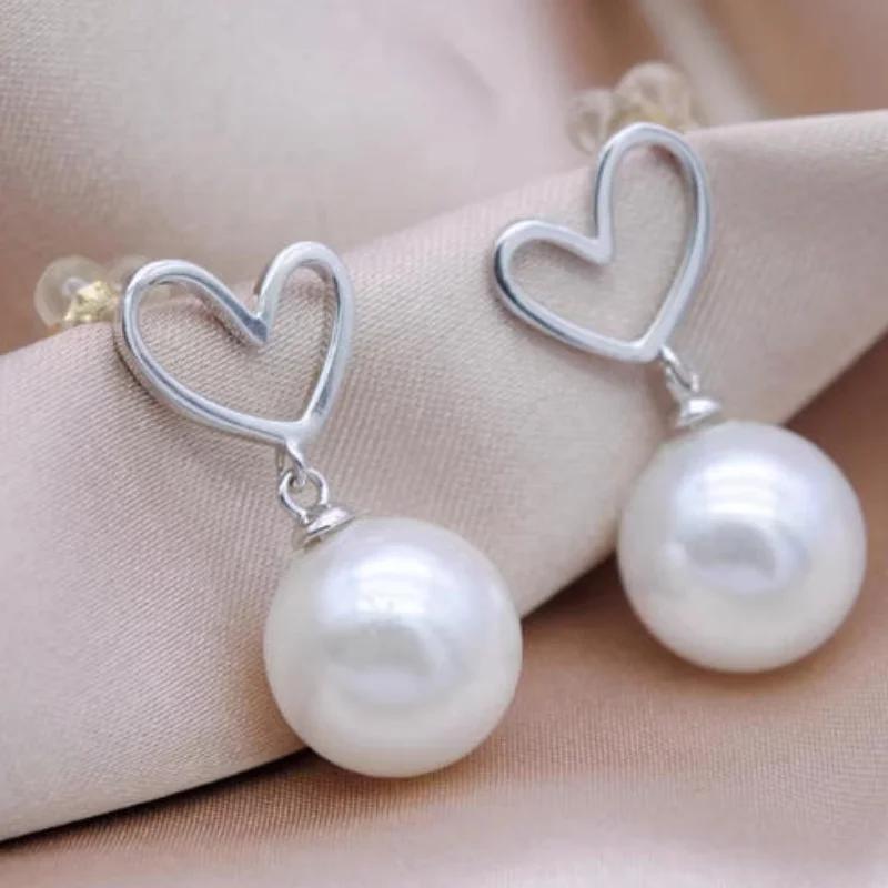 

Exquisite pair of 9-10mm natural South Sea round white pearl earrings 925 silver